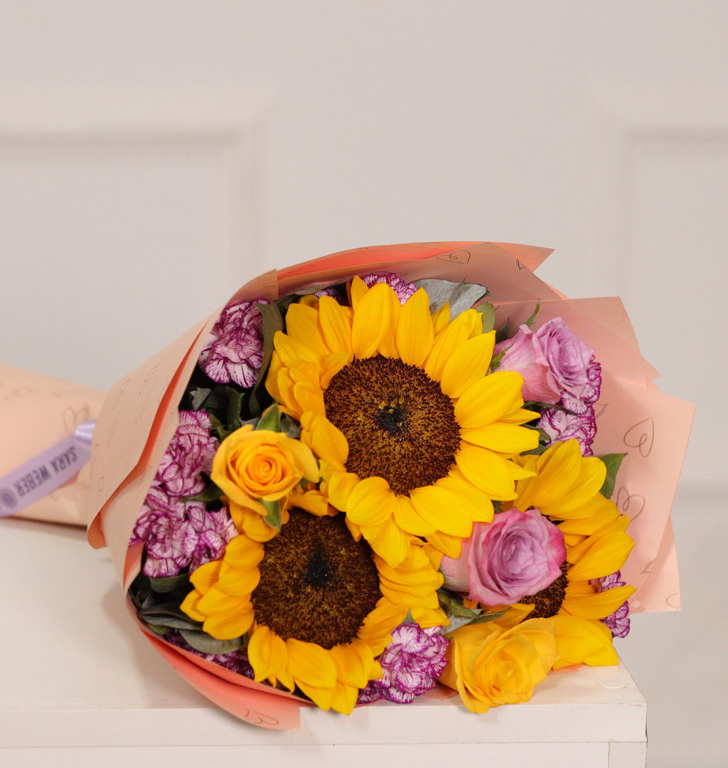 ramo-de-rosas-y-girasoles-hechados